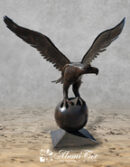 Large American Eagle on Ball Looking Left