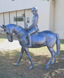 Girl Jockey on Horse